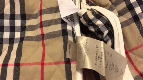 how to spot a fake burberry brit quilted jacket|spotting a burberry coat.